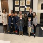 Southside Students with Mrs. Mickens and Mrs. Adkins pose for picture at School Board Office